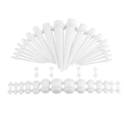 A white ear stretching kit featuring a complete set of tapers and plugs in various sizes, displayed on a white background.