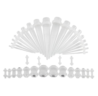 A white ear stretching kit featuring a complete set of tapers and plugs in various sizes, displayed on a white background.