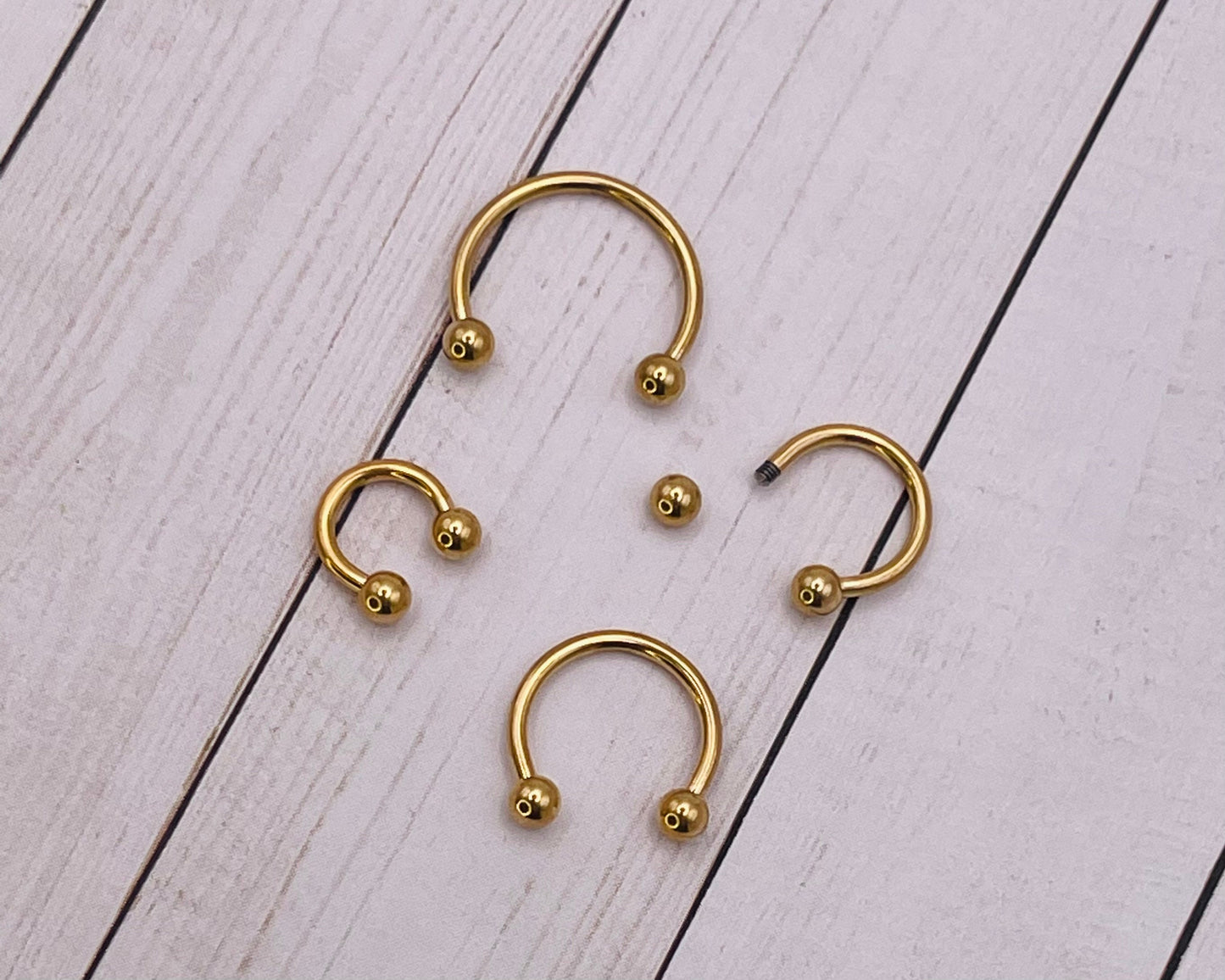 Gold HORSESHOE G23 Titanium Septum Ring - Septum Clicker 16 Gauge 1.2mm hinged Segment clicker - Nose - Conch - Ear