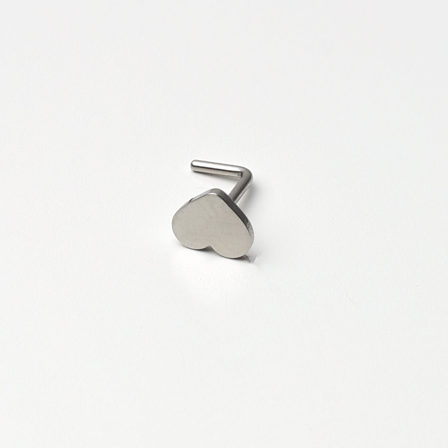 Stainless Steel L Shaped Nose Stud in various Designs including stars, hearts, infinity, butterfly, lock, for nose piercings