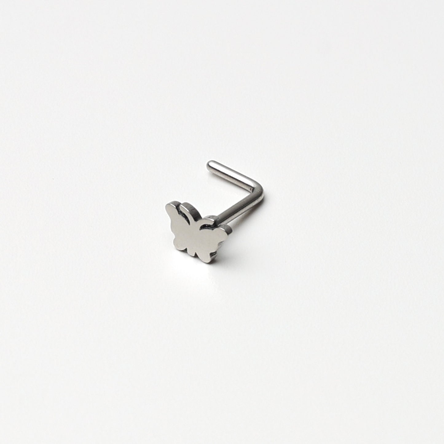 Stainless Steel L Shaped Nose Stud in various Designs including stars, hearts, infinity, butterfly, lock, for nose piercings