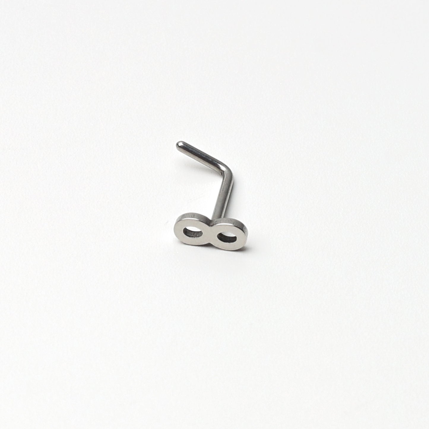 Stainless Steel L Shaped Nose Stud in various Designs including stars, hearts, infinity, butterfly, lock, for nose piercings