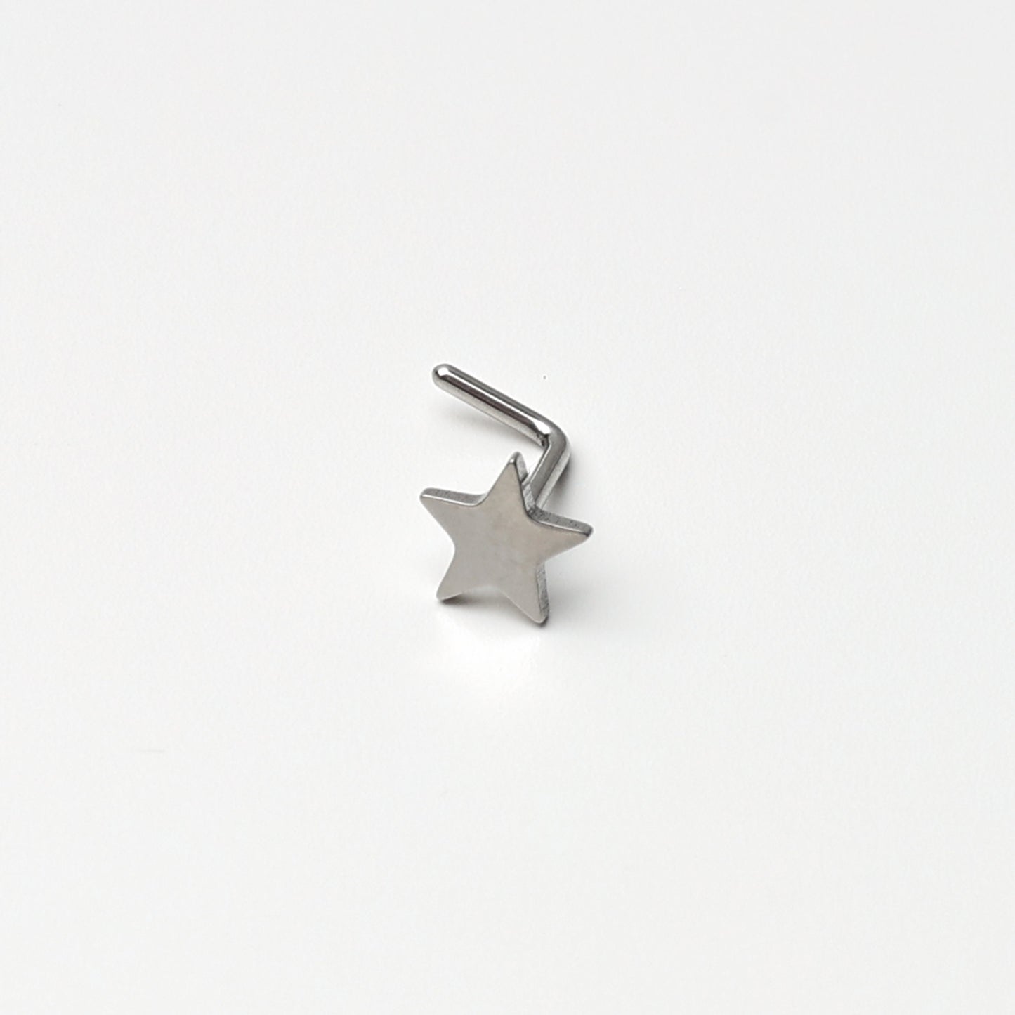 Stainless Steel L Shaped Nose Stud in various Designs including stars, hearts, infinity, butterfly, lock, for nose piercings