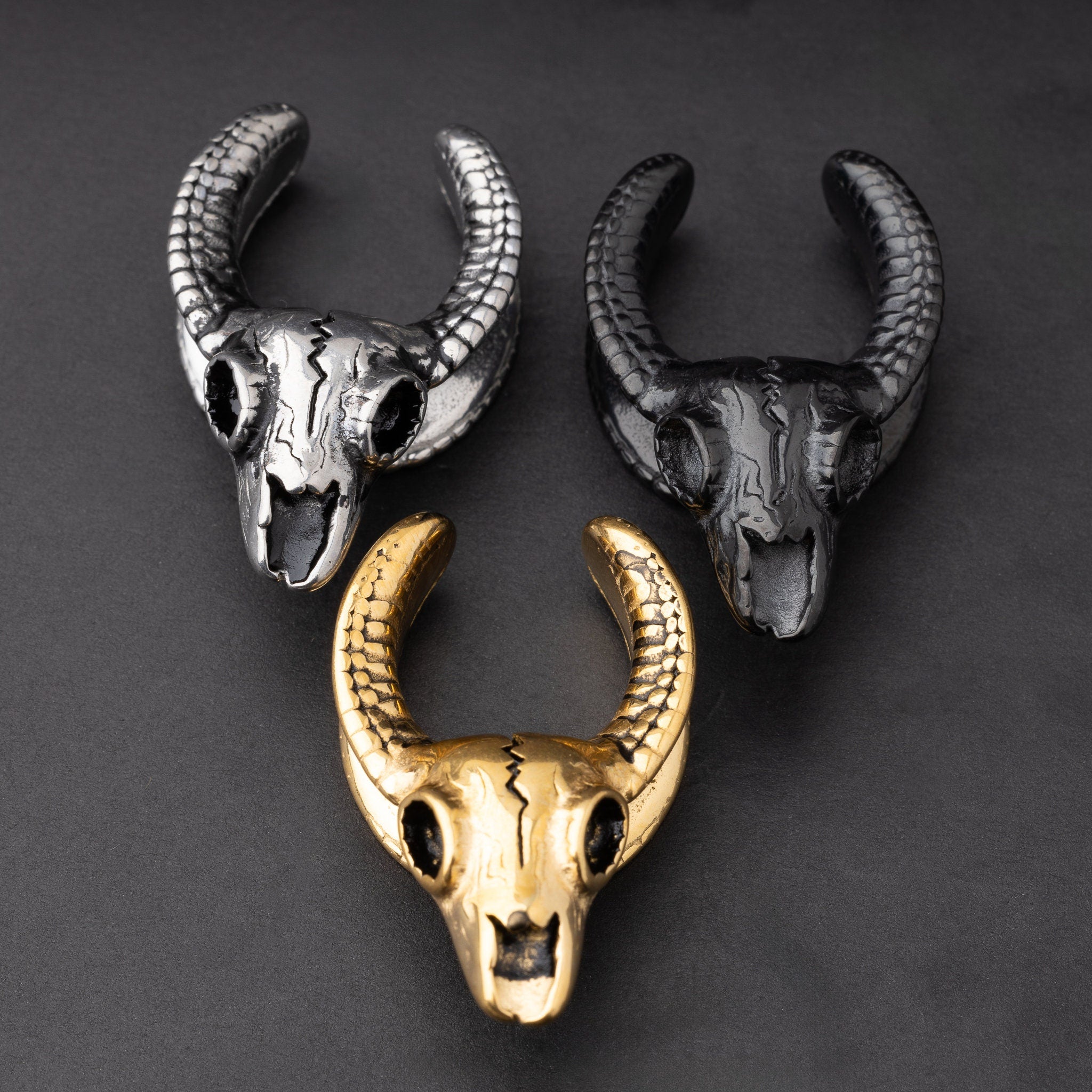 Pair of Skull Ear Tunnels, Saddle Ear Plugs in Gold, Silver, and Black. Ear Saddle Hangers For Stretched Ears, Gothic Plugs and Tunnels